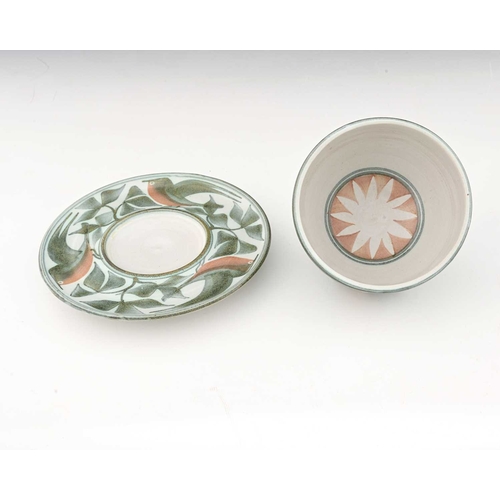 797 - Lawrence McGowan (British, 1942), a stoneware bowl and saucer, decorated with on-glaze robin and flo... 