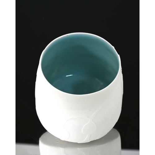 801 - Grainne Watts (British, 20th/21st Century), a hand-carved porcelain vase, (Kelp series), celadon gla... 