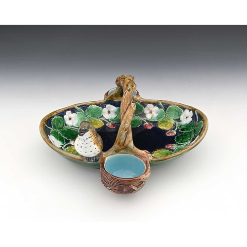 815 - A Holdcroft majolica strawberry dish, modelled in relief as a basket with flowering and fruiting str... 