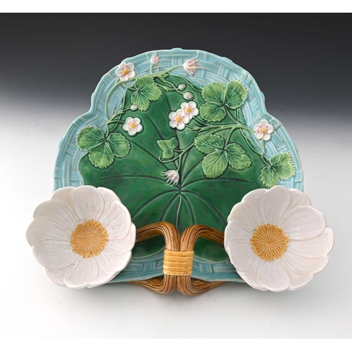 818 - A George Jones majolica strawberry dish, 1876, modelled in relief as a lily pad on basket weave grou... 