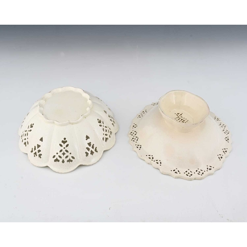 823 - Two English creamware reticulated dishes, circa 1780, lobed form with pierced foliate and trellis mo... 