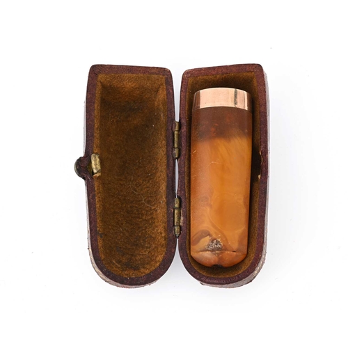 9 - An Edwardian 9ct gold mounted amber cheroot, hallmarks for Birmingham 1910, with case, length 4.8cm,... 