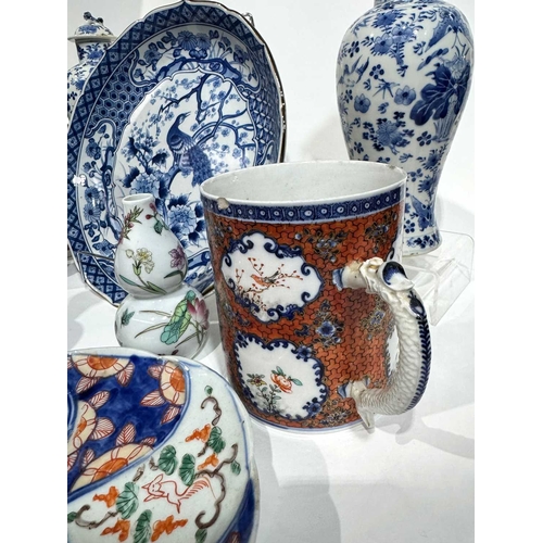 1 - A collection of Chinese and Japanese ceramics including a pair of blue and white painted inverse bal... 