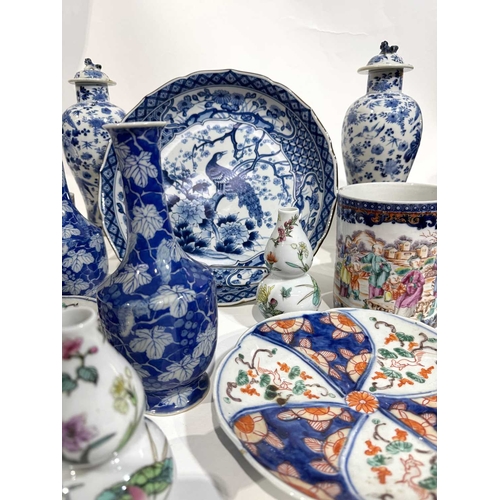 1 - A collection of Chinese and Japanese ceramics including a pair of blue and white painted inverse bal... 