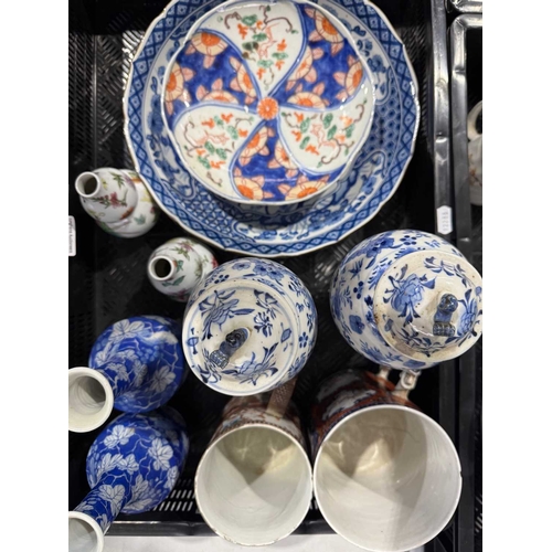 1 - A collection of Chinese and Japanese ceramics including a pair of blue and white painted inverse bal... 