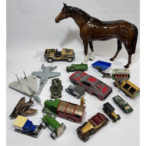 101 - A large Beswick horse 37cm long, 29cm high together with model cars and planes, 'Tri-ang', 'Dinky' e... 