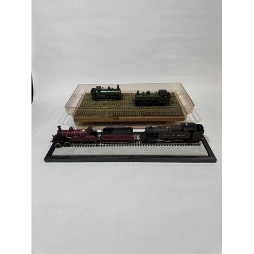 103 - Scratch-built model trains: one with a wagon, two in green livery one with a 1925 plate the other GW... 