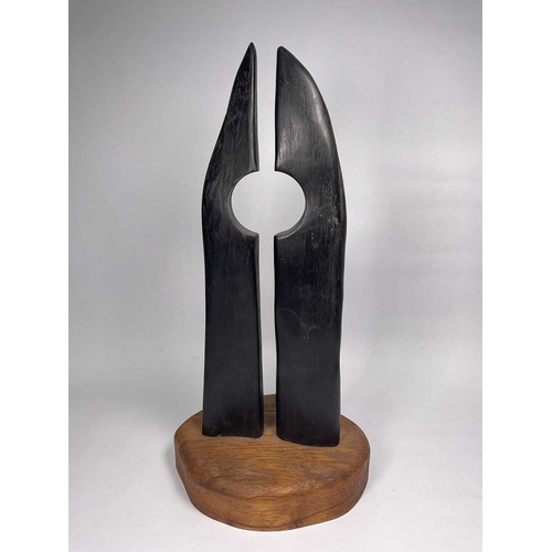 119 - Fergus Costello (Irish, Contemporary), 'Untitled' sculpted bog oak mounted on a pine base, 37cm high... 