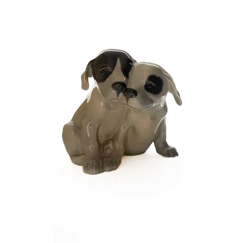 139A - Royal Copenhagen figure group of black and white glazed puppies, marks, painted and incised number '... 