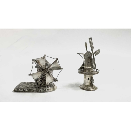 16 - Two detailed miniature windmills cast in white metal, indistinct marks to bases, both with turning s... 