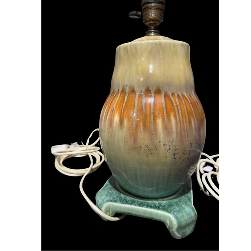 162 - Ruskin Pottery, five Crystalline glazed lamp bases, circa 1930, two with integrated stands, blue and... 