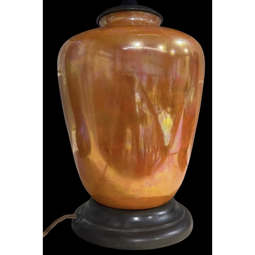 163 - A Ruskin Pottery orange lustre lamp base, with Tiffany style leaded glass shade, shouldered form on ... 