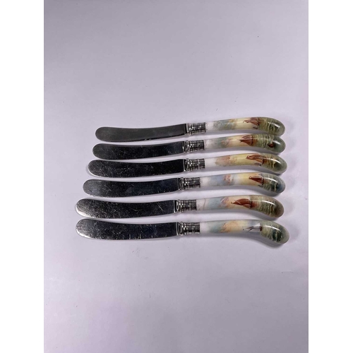 203 - A set of six Royal Worcester bread knives with hallmarked silver collars and ceramic painted with sa... 