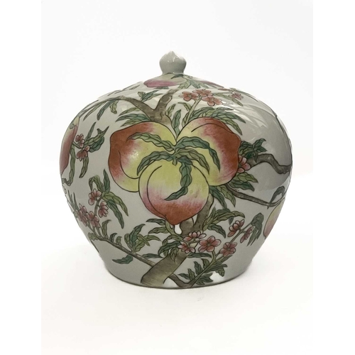 207 - Chinese porcelain Nine peaches ginger jar with lid, signed at base, approx 20cm wide and high (1)... 