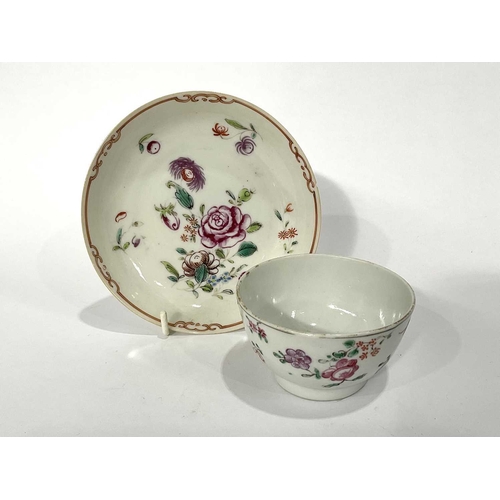 217 - A tea bowl and saucer, with hand-painted floral decoration, possibly 18th century, with a Guangxu st... 