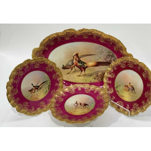 23 - A 'Game Bird' series Limoges dinner service, 10 plates together with a large oval platter, each uniq... 