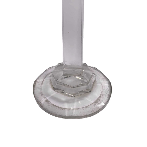 230 - A heavy cut glass lamp, trumpet form top supported on a tapered column and circular stepped base, 58... 