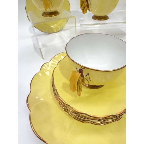 25 - An Aynsley 'Butterfly' tea service, c.1930, naturalistically moulded to resemble open flowers with r... 