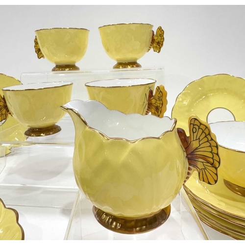 25 - An Aynsley 'Butterfly' tea service, c.1930, naturalistically moulded to resemble open flowers with r... 