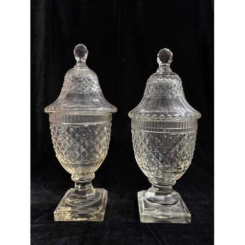 259 - A pair of Anglo Irish type diamond cut urn vases and covers, 32.5cm high, a large trumpet form wine ... 