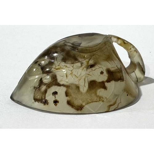 288 - A Chinese moss agate-type libation cup carved as a flowering branch, the stem forming a handle, 8cm ... 