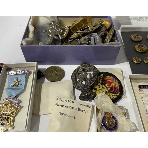 299 - A large quantity of military cap and pin badges and buttons, many gilt enamel examples, boxed gilt e... 