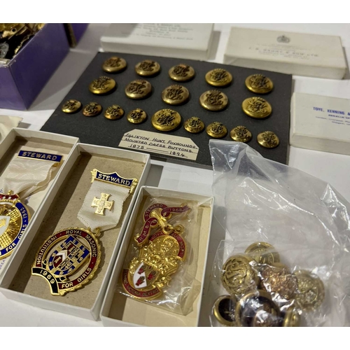 299 - A large quantity of military cap and pin badges and buttons, many gilt enamel examples, boxed gilt e... 