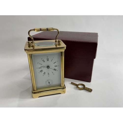 308 - Matthew Norman of London, 'Miniature 30-day carriage clock timepiece' brass carriage case with bevel... 