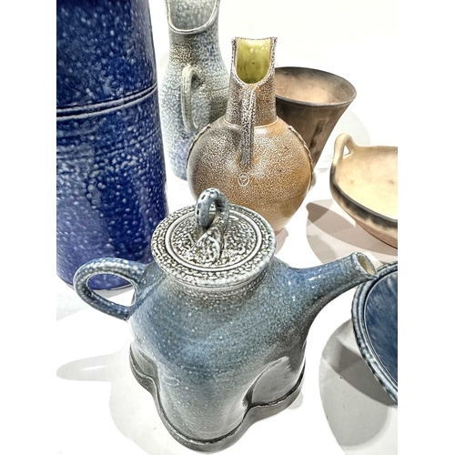 32 - A collection of salt glazed stoneware studio pottery and ash glazed examples, in the style of Walter... 