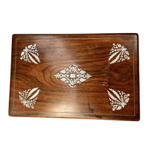 321 - A 19th century rosewood writing slope, mother of pearl inlay to exterior, gothic revival style toole... 