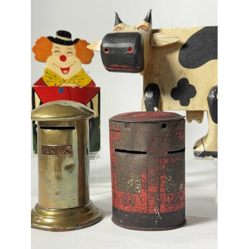 360 - A collection of novelty moneyboxes, metal examples in the form of post boxes together with a hand-pa... 