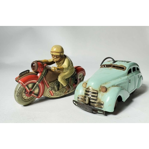 361 - A Schuco tin plate clockwork motorcycle and rider, no key, approx. 12.5cm long, together with a Schu... 