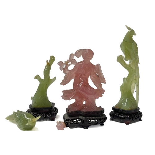 366 - A small collection of jade-type and rose quartz-type carved figurines on stands, two birds and a sea... 