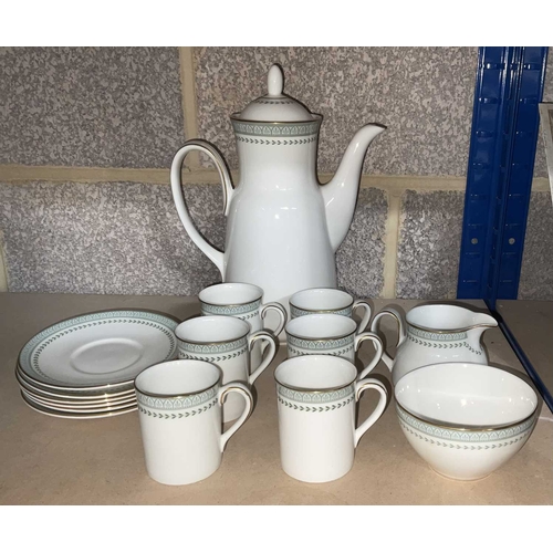 37 - A set of Royal Doulton, 'Berkshire' porcelain coffee service with Honeysuckle rim in sage green, set... 