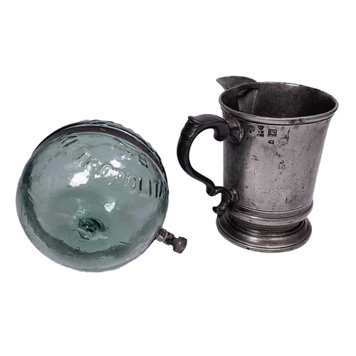 372 - A 19th century pewter pint measure tankard with spout, stamps include a 'VR' verification mark, engr... 