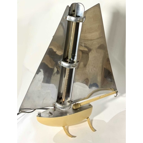 389A - A 1930's Art Deco heater styled as a sailboat by Bunting Electric Company, the sails with a mirror f... 