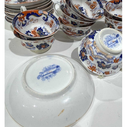 39 - A part MInton tea service, in the Amherst pattern, no;824, 11saucers, 9 cups, 3 tea p[ates, (1 tray)... 