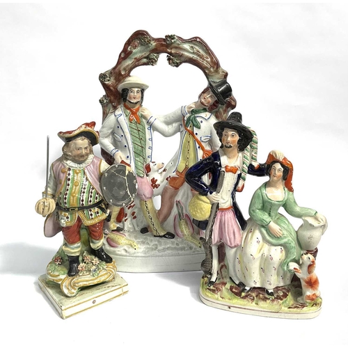 42 - A Pearlware 'Falstaff' figurine together with two 19th century Staffordshire figure groups, glazed, ... 