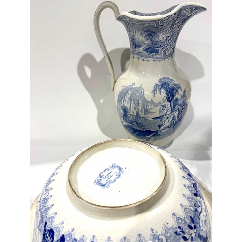 45 - A 19th century blue and white transfer printed jug and bowl, bowl with a patterned back stamp 'Egypt... 