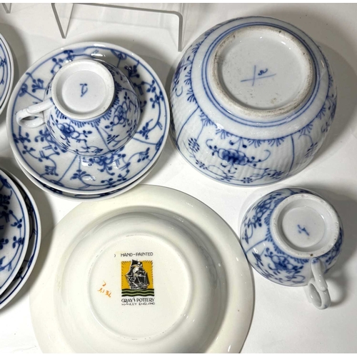 5 - A Meissen-type blue and white tea service decorated in the Oriental style with trailing floral desig... 