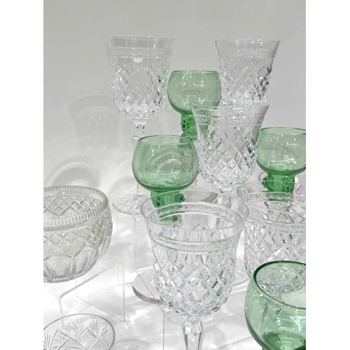 54 - A set of nine Bohemian uranium green and colourless glass Roemer type hock glasses, with raspberry p... 