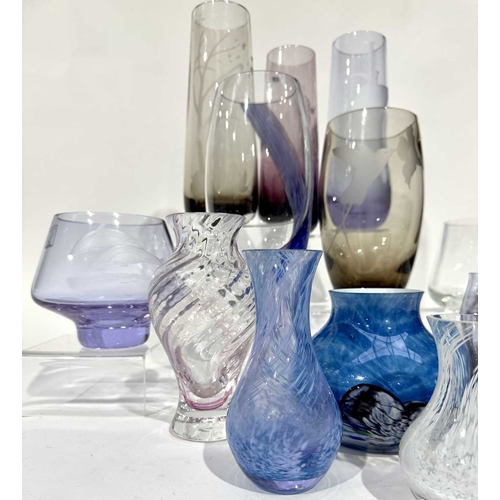 60 - A large collection of Caithness glassware of varying colours and sizes, including etched vase design... 