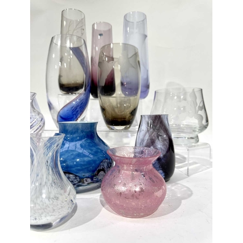 60 - A large collection of Caithness glassware of varying colours and sizes, including etched vase design... 