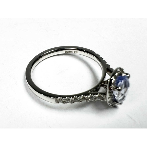 621 - A platinum pear-shape sapphire and brilliant-cut diamond cluster ring, sapphire estimated weight 1ct... 