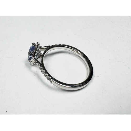 621 - A platinum pear-shape sapphire and brilliant-cut diamond cluster ring, sapphire estimated weight 1ct... 