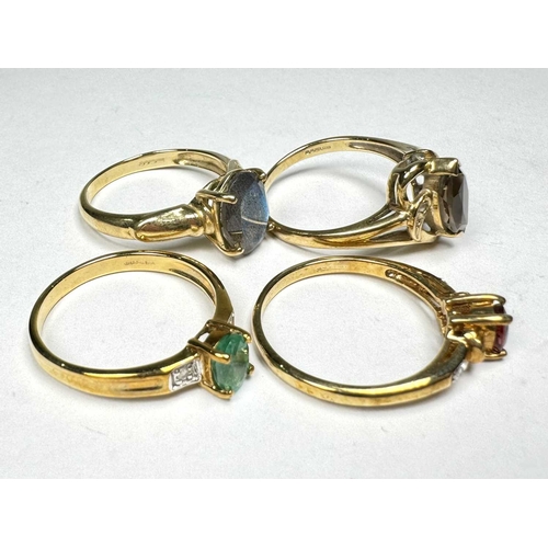 629 - Four 9ct gold gem-set rings, gems to include ruby, emerald, diamond, labradorite etc, hallmarks for ... 