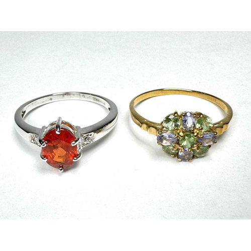 633 - Two 9ct gold gem-set rings, to include an orange sapphire single-stone ring, together with a green g... 