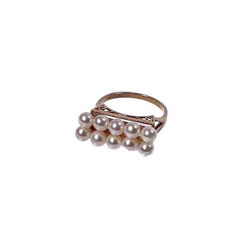 634 - A 14ct gold cultured pearl two-row ring, cultured pearls measure approximately 5mm, band stamped k14... 