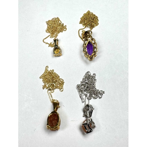 640 - Four gold coloured metal gem-set pendants, gems to include moonstone, sphene, amethyst and sunstone,... 