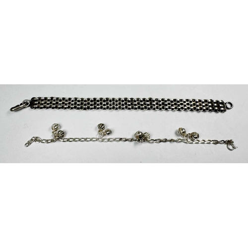 648 - Two silver bracelets, to include a bracelet with bell charms, stamped 925, lengths 19 to 19.5cm, 44.... 